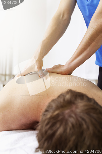 Image of young man at the physio therapy