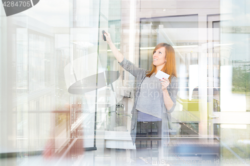 Image of Businesswoman giving a talk.