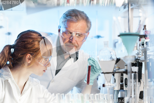 Image of Health care researchers working in scientific laboratory.