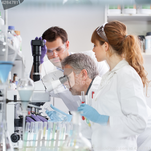 Image of Health care researchers working in scientific laboratory.