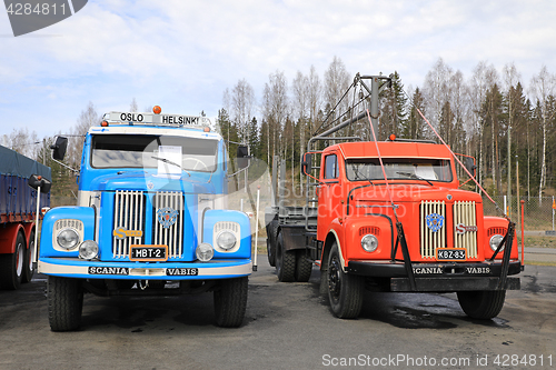 Image of Two Classic Scania 76 Trucks on Display