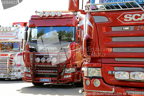 Image of Row of Shiny Show Trucks 