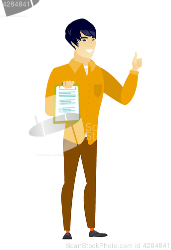 Image of Businessman with clipboard giving thumb up.
