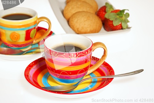 Image of Coffee , biscuits and strawberries
