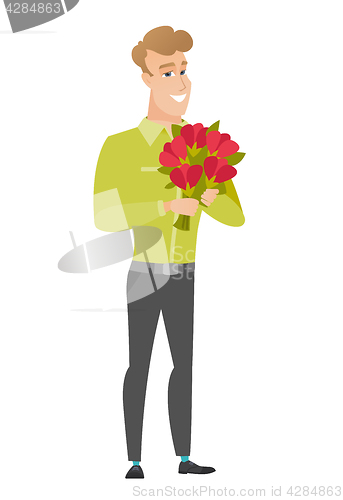 Image of Caucasian businessman holding a bouquet of flowers