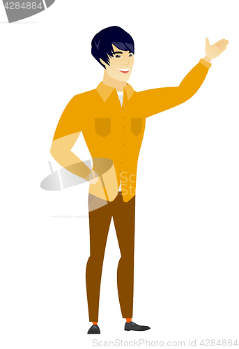 Image of Asian businessman showing a direction.
