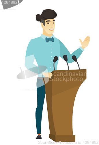 Image of Politician giving a speech from tribune.