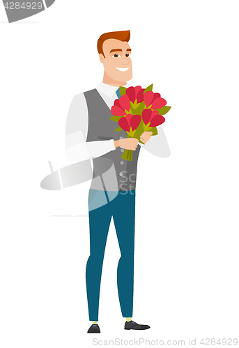 Image of Caucasian businessman holding a bouquet of flowers