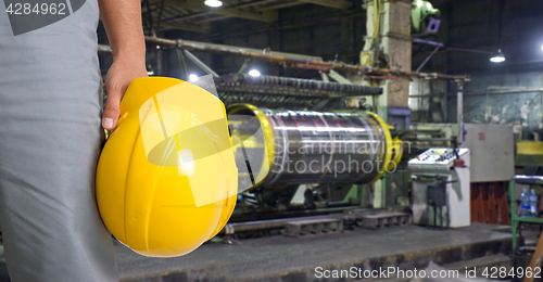 Image of Worker with safety helmet