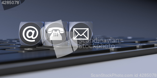 Image of three cubes with signs for email phone and letter