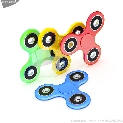 Image of four fidget spinner in different colors