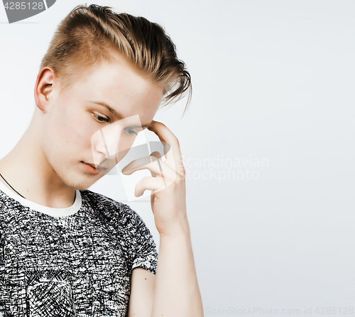 Image of young handsome teenage hipster guy posing emotional, happy smiling against white background isolated, lifestyle people concept 