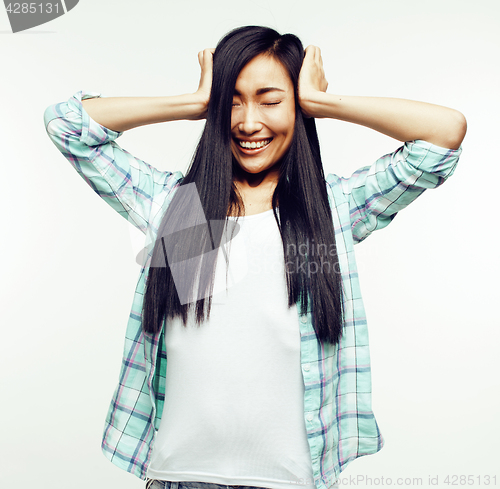Image of young pretty asian woman posing cheerful emotional isolated on white background, lifestyle people concept 
