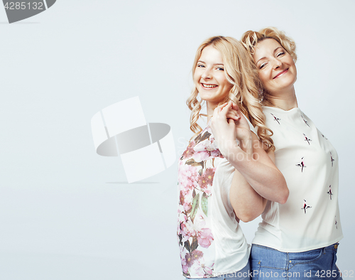 Image of mother with daughter together posing happy smiling isolated on white background with copyspace, lifestyle people concept 