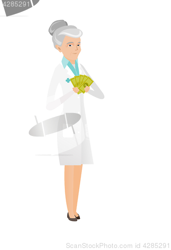 Image of Senior caucasian doctor holding money.