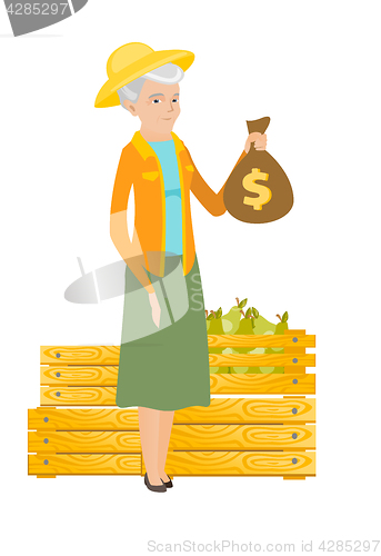 Image of Senior caucasian farmer holding a money bag.