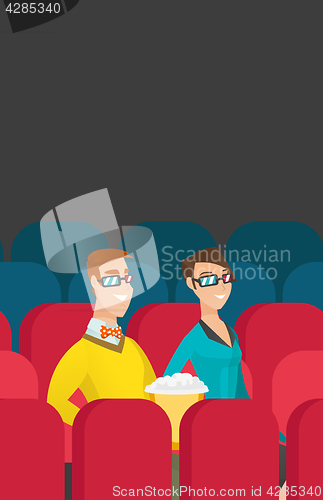 Image of Caucasian couple watching 3D movie in the theatre.