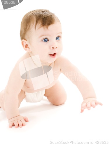 Image of crawling baby boy in diaper