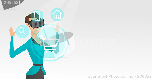 Image of Woman in virtual reality headset shopping online.