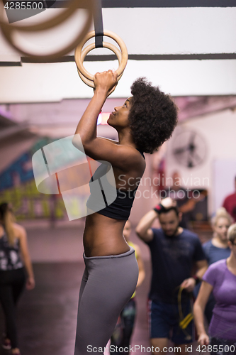 Image of black woman doing dipping exercise