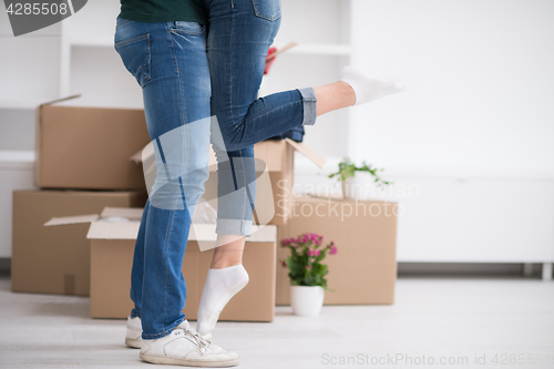 Image of happy Young couple moving in new house