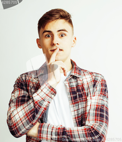 Image of young handsome teenage hipster guy posing emotional, happy smiling against white background isolated, lifestyle people concept 