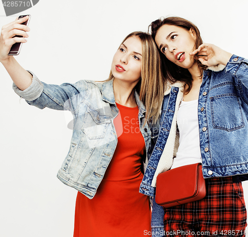 Image of best friends teenage girls together having fun, posing emotional on white background, besties happy smiling, lifestyle people concept close up