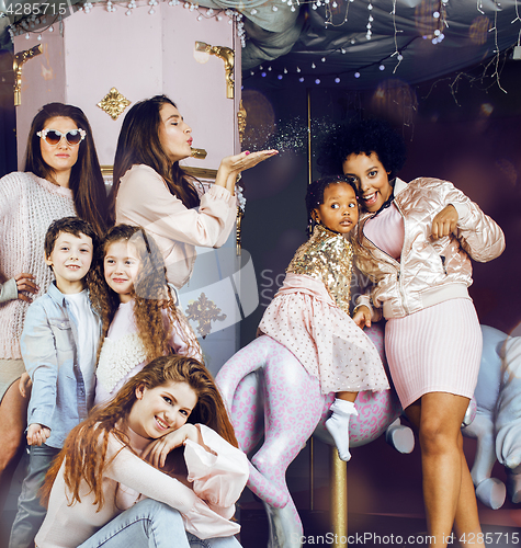 Image of Lifestyle and people concept: young pretty diversity nations woman with different age children celebrating on birth day party together happy smiling, making selfie. African-american, asian and caucasi