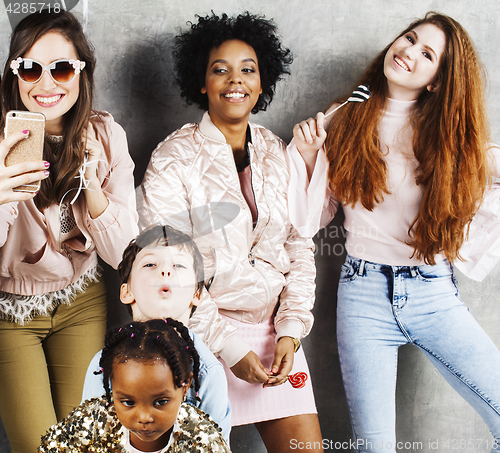 Image of Lifestyle and people concept: young pretty diversity nations woman with different age children celebrating on birth day party together happy smiling, making selfie. African-american, asian and caucasi