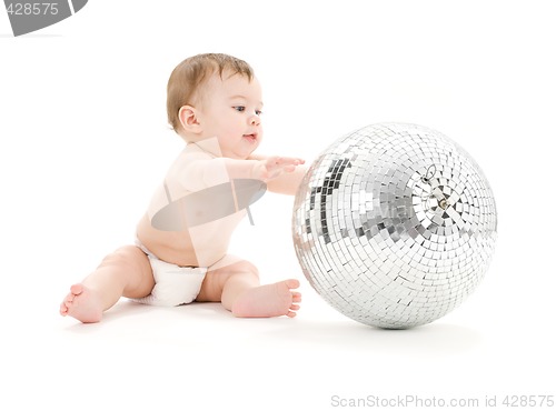 Image of adorable baby boy with big disco ball