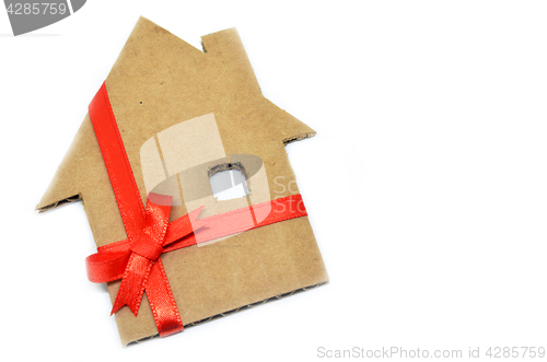 Image of House from cardboard with ribbon