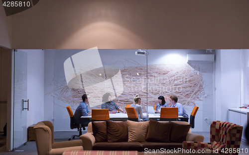 Image of Business Team At A Meeting at modern office building