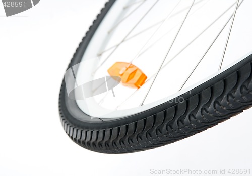 Image of Bicycle wheel with orange reflector