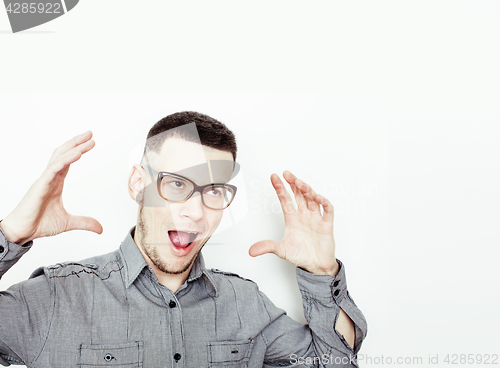 Image of young handsome teenage hipster guy posing emotional, happy smiling against white background isolated, lifestyle people concept 