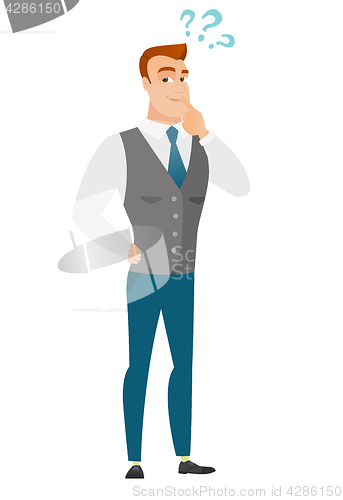 Image of Thinking businessman with question marks.