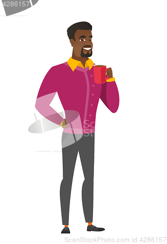 Image of African-american businessman holding cup of coffee