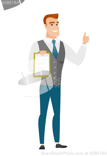 Image of Businessman with clipboard giving thumb up.