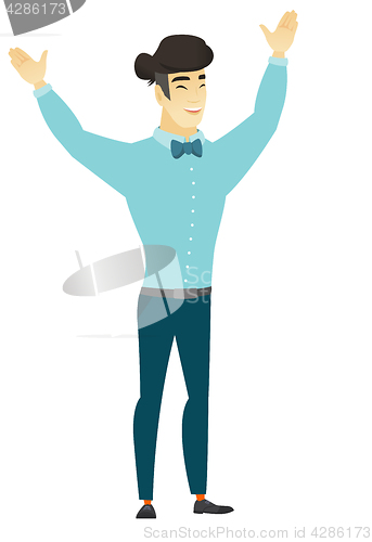 Image of Successful asian businessman jumping.