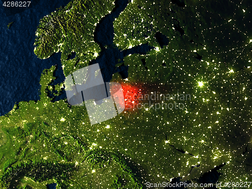 Image of Lithuania in red from space at night