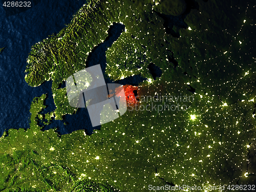 Image of Estonia in red from space at night