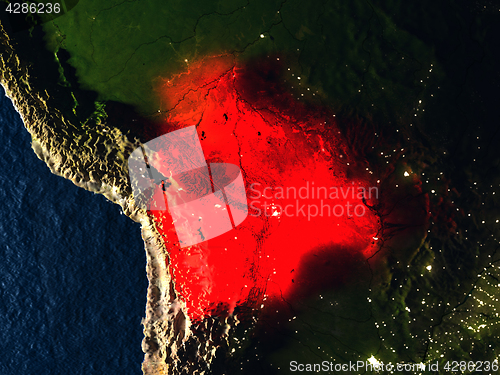 Image of Bolivia in red from space at night