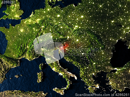 Image of Slovenia in red from space at night