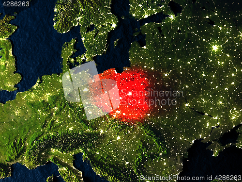 Image of Poland in red from space at night