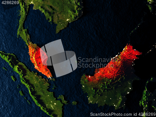 Image of Malaysia in red from space at night