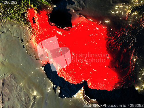 Image of Iran in red from space at night