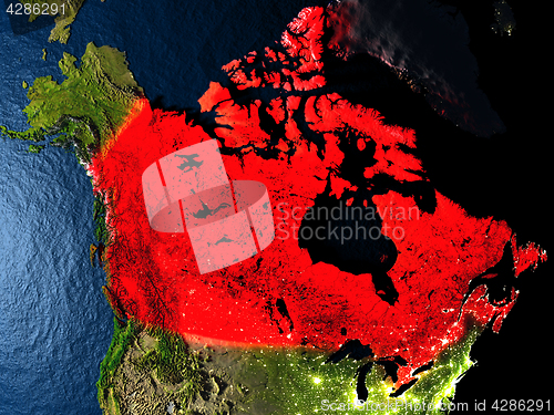 Image of Canada in red from space at night