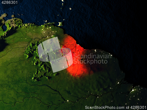 Image of Guyana in red from space at night