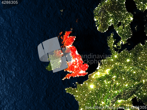 Image of United Kingdom in red from space at night