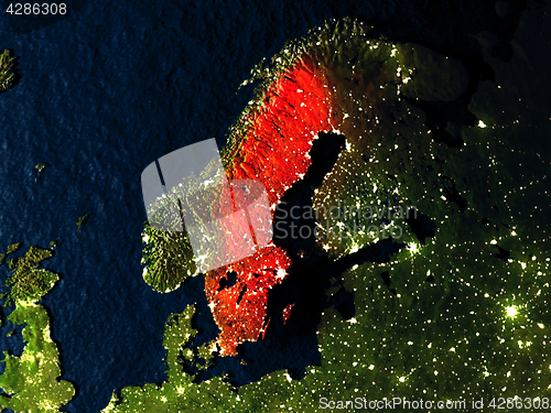 Image of Sweden in red from space at night