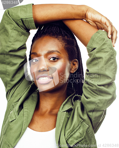 Image of young pretty african-american girl posing cheerful emotional on white background isolated, lifestyle people concept 